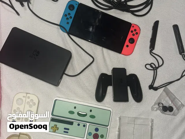Nintendo Switch - Neon Blue + Neon Red Joy-Con/ نينتندو سويتش OLED ( أزرق نيون وأحمر ) للبيع