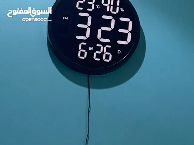 Digital clocks   Philips toaster and   hand mixer.