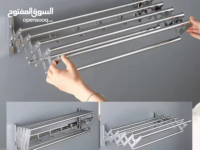 منشر الغسيل الجداري الألمنيوم القابل للطي – الذكاء في التنظيم وتوفير المساحة عملي وأنيق لترتيب .