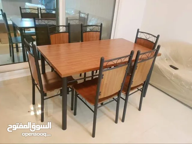 brand new dining table with four and six chairs