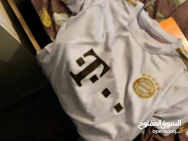 BAYERN original prime set . includes T-shirt and shorts. white colour and golden remix. buy now.