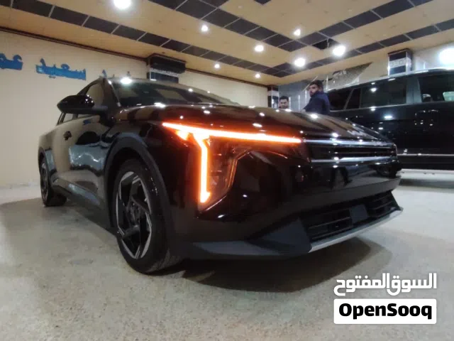 2025 كيا K4 EX