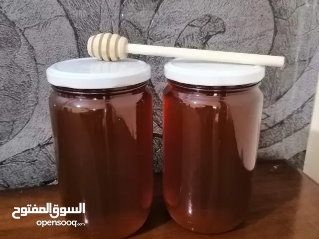 يوجد عسل طبيعي مكفول 100٪ من جبال عجلون _ عرجان سعر الكيلو 15 دينار + هدية علبة حبوب لقاح