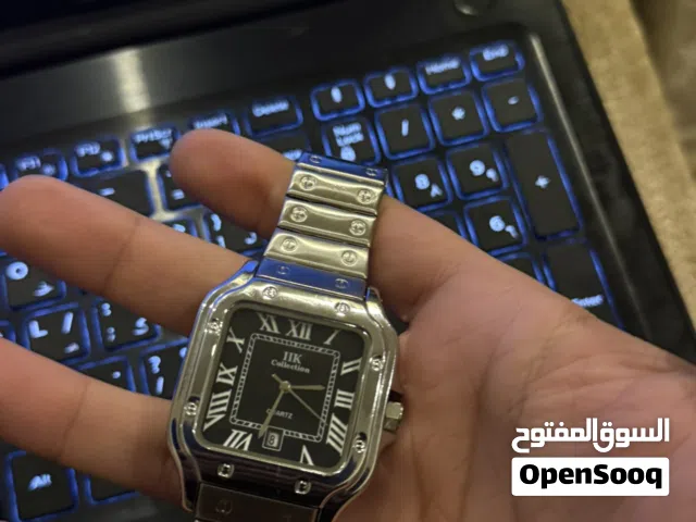 ساعة ستايل cartier معدن حالتها ممتازه وشغاله مية بالمية عقارب وتاريخ