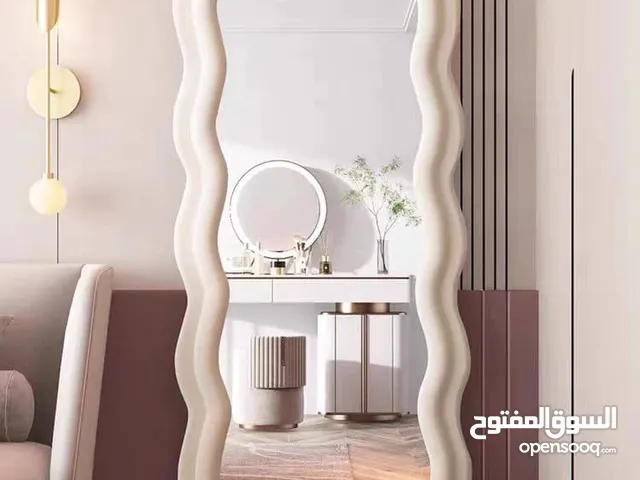 مرايا ترند عالمياً... تصميم موجي ومنحوت فخم يخلي أي زاوية تصير قطعة فن جاهزة للتصوير