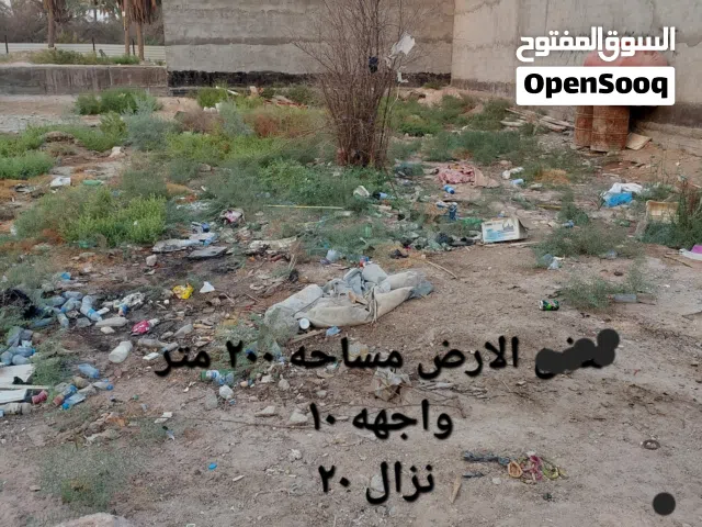 أرض زراعيه 200 م اصوليه صاحب الأرض عراقي  قرب مدارس  البيارق