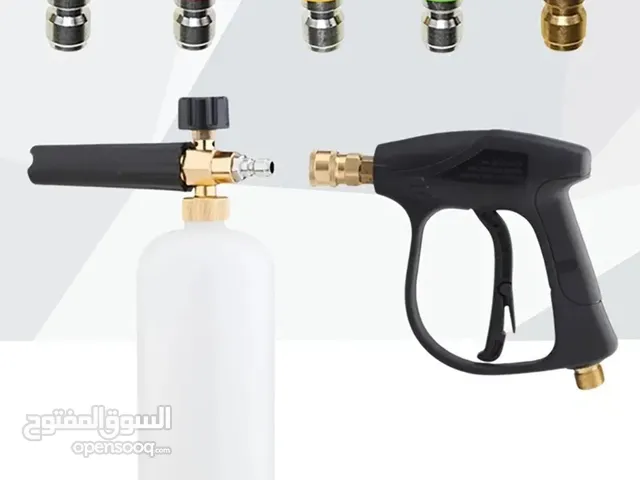 Pressure washer gun with foam bottle