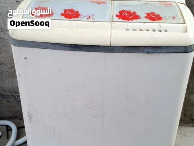 غسالة ملابس تشتغل غسل وتنشيف شرط الفحص