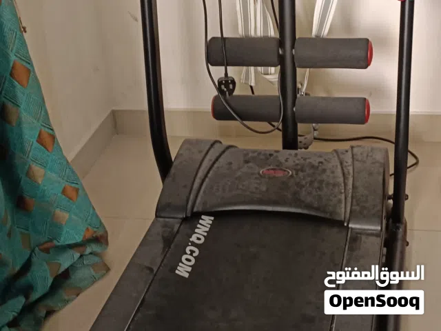 Used treadmill and weights along with dumbbells for sale.