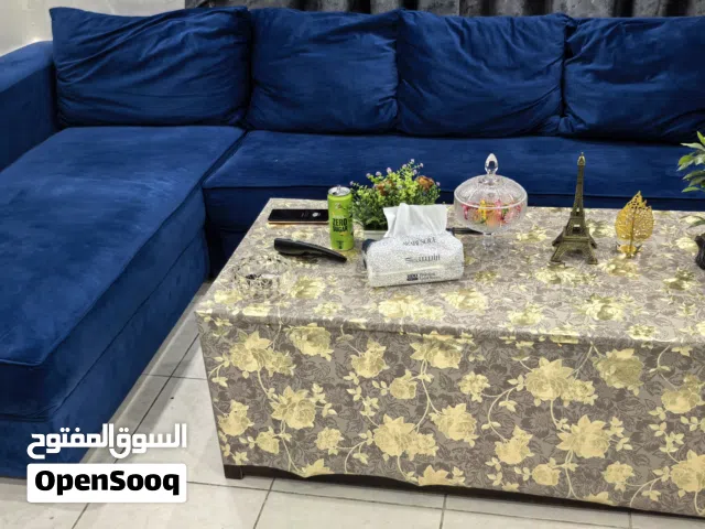 طقم كنب L مع طاولة وسط