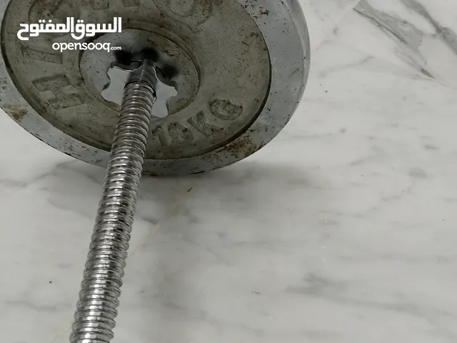 بار مع طارتين كل طاره 10 كيلو مع دامبل 12 كيلو