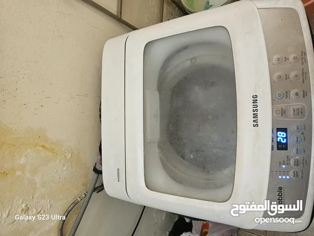 غسالة سامسونج 7 كم غطاء من اعلي بحالة ممتازة بدن اي عيوب في برامج التشغيل