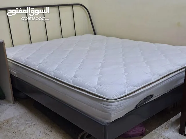 Bed with mattress for sale in Abu Dhabi