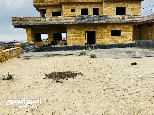 1000 m2 More than 6 bedrooms Villa for Sale in Zarqa Al-Kamsha