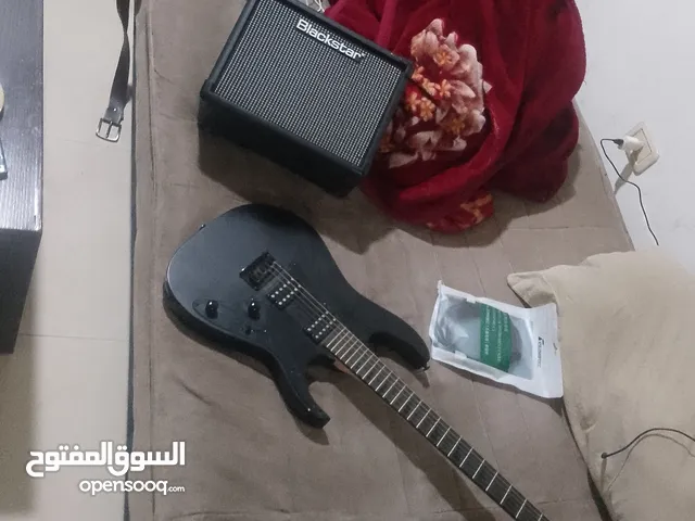 Ibanez electric guitar with amplifier
