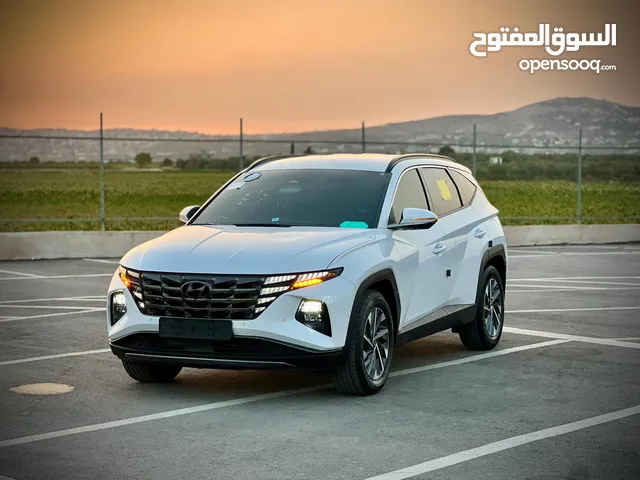 هونداي توسان /2022 فل الفل بدون فتحة سقف  2x4 ///240Hp بنزين + كهرباء  ( Haybrid) 1600cc