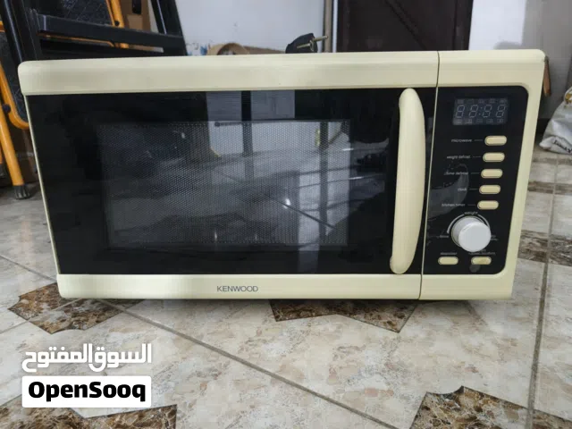 مايكرويف مستعمل نظيف مع الكفر بسعر مناسب