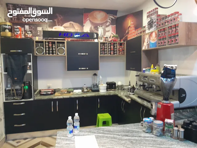 دولاب قهوة بالرخام والديكور متعه، الطول 5متر في في 3متر ارتفاع معلق وعمق 60 سانتي