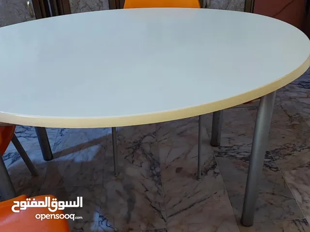 ميز طعام خشب والارجلينات ستيل مع 6كراسي بلاستك