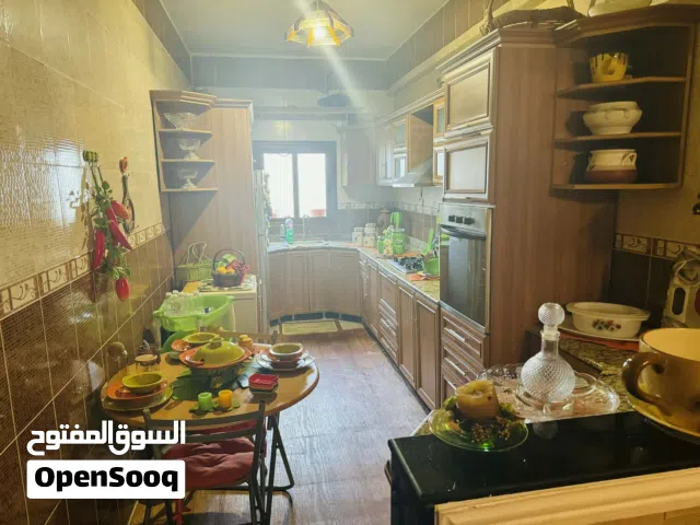 شقة للبيع او الاستبدال لي منزل بالقرب من مول عين زارة