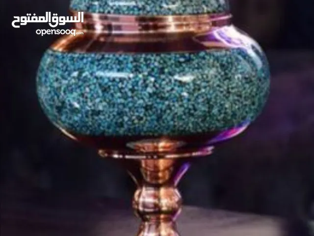 شوكولاتة ذات جسم نحاسي وفيروزي، أصلها من نيشابور، إيران