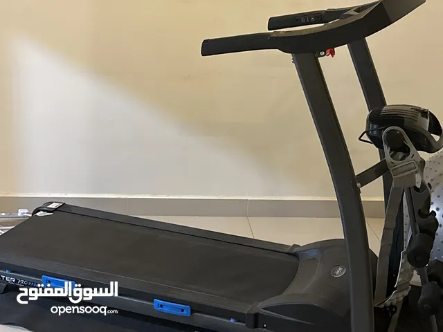 Treadmill with mat