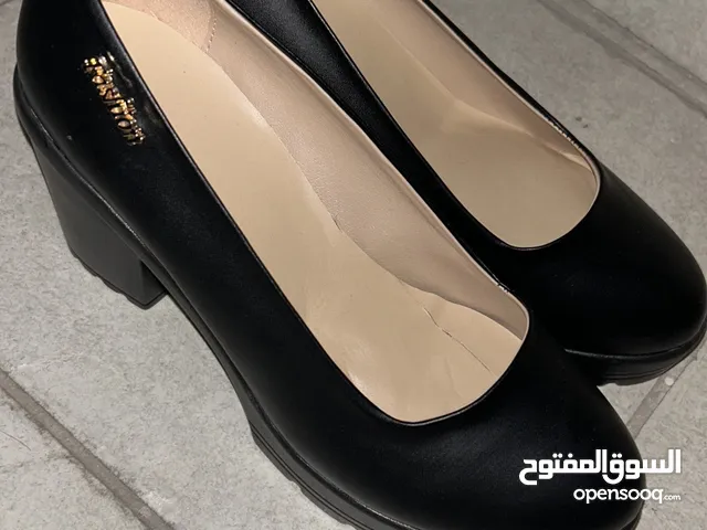 Black With Heels in Kuwait City