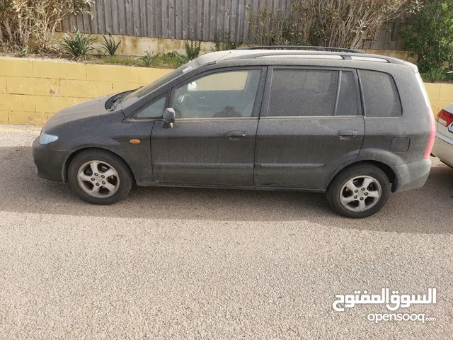 Mazda 323  in Tripoli