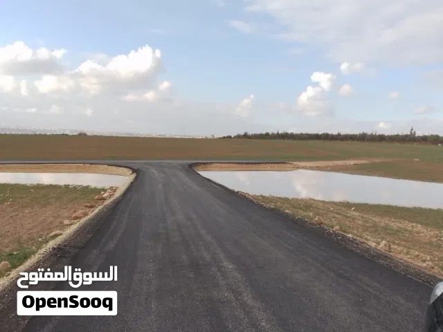 أراضي مدينة IMAAR 10 للبيع 1000م2 سكن ( أ ) تبعد 9كم عن جسر المطار باتجاه مادبا - حواره