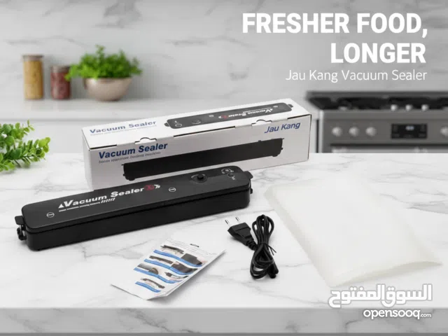 vacuum sealer - آلة تغليف
