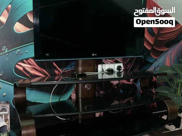 ميز تلفزيون جام اسود وخشب بني