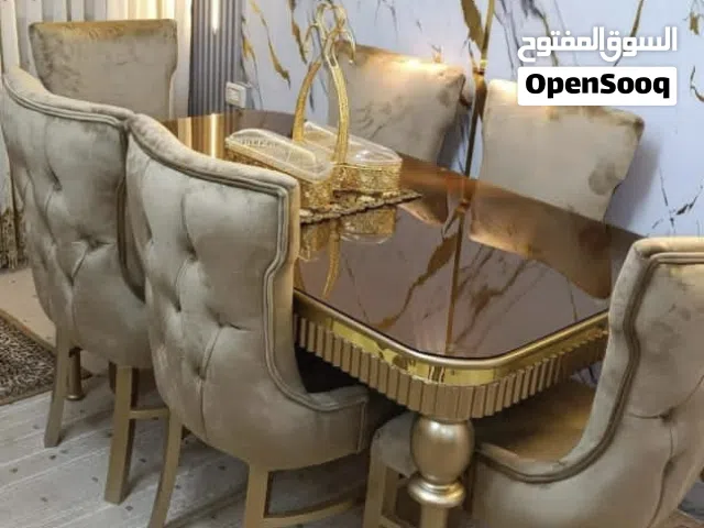 طاولات سفره فخمه خشب الزان ولاتيه وزجاج حراري يوجد خدمه توصيل ومعاينه لجميع المحافظات