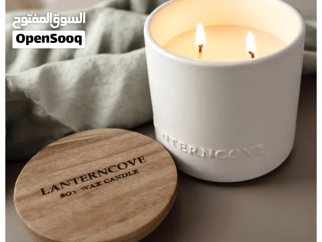 شمع الصويا النقي مُغلّفة بعلبة.