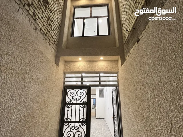 عقار على شارع تجاري في الاعظمية (السفينة) (عيادة /او مكتب )