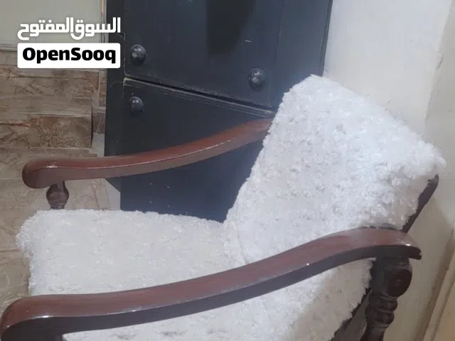 كرسي خشبي كنب
