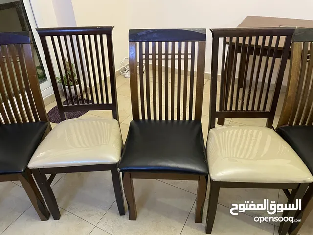 Wooden Dining Table set with 5 chairs in good condition
