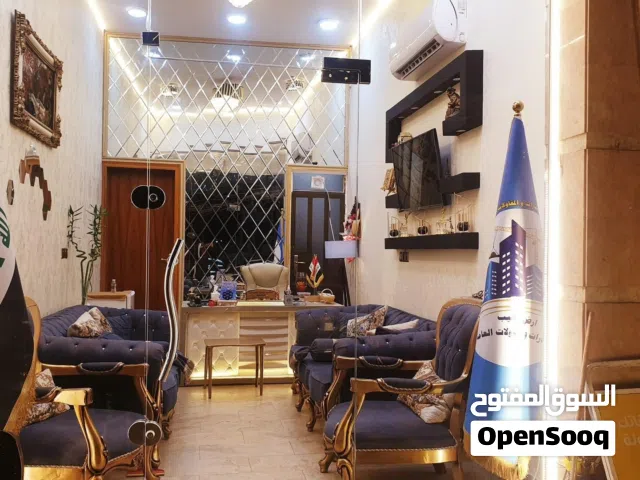 بنايه تجاريه وقطع أراضي للبيع  منصور داوودي يرموك حي الجماعه  والمناطق المجاوره