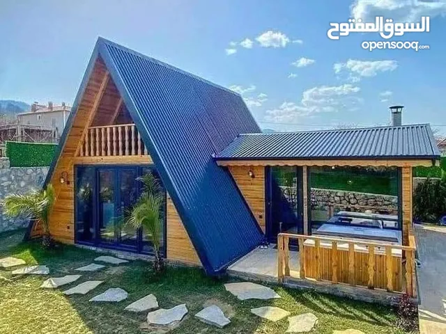 مشتل نبع القيروان للتنسيق الحدائق... ووبناء الاكواخ الخشبيه
