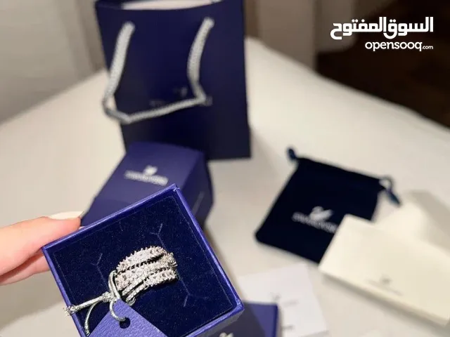 خاتم نسائي من ماركة سوارفسكي وكارتير ماستر كوالتي مع جميع المرفقات توصيل لجميع المناطق