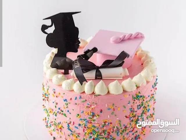 حلويات كيك تخرج وحلويات عربي بسبوسه وكنافه وترافل منجه و فروله