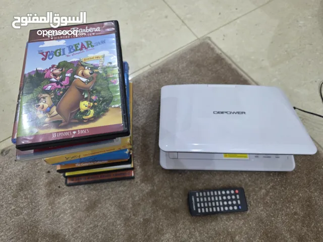 للبيع مشغل dvd متنقل مع مجموعه dvd متنوعه