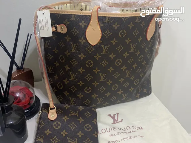 brown Louis Vuitton for sale  in Muscat