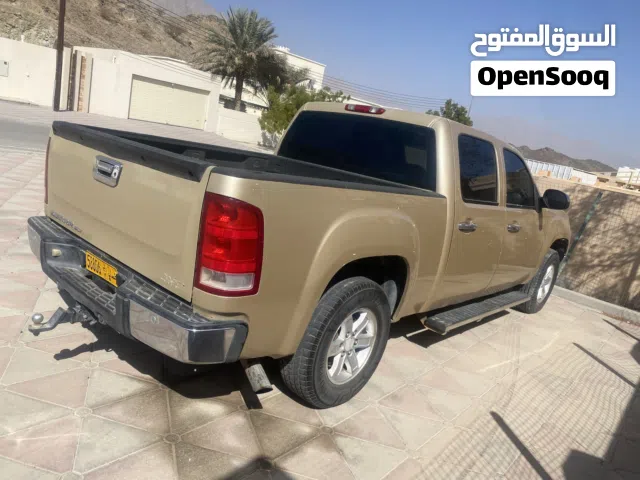 سييرا 2007 ديمنالي برتقالي ببيك اب مع مواصفات أمريكية، مرخصة، مستعملة بجودة جيدة