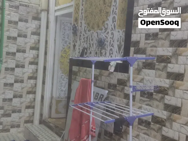 بيت للبيع   حي الحسين.