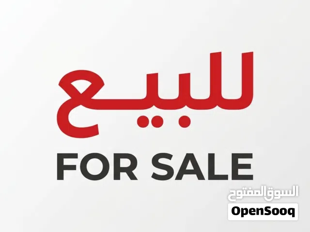 ارض بيها ورشة ومحل للبيع