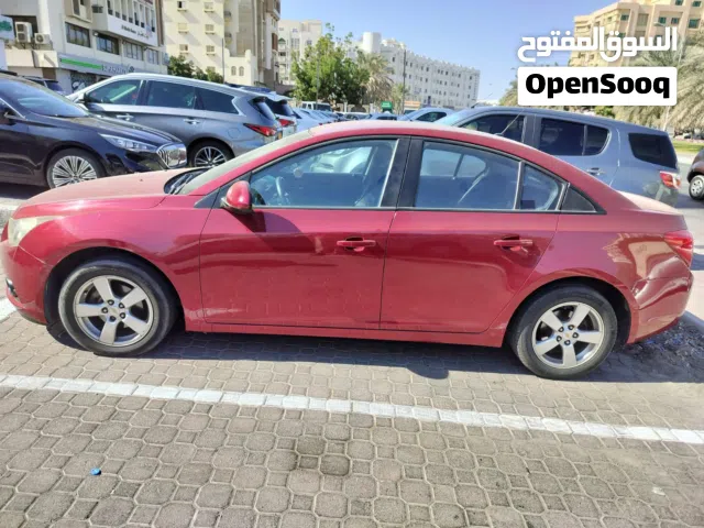 2012 Chevrolet Cruze LS Sedan GCC Specs - Good Condition with Keyless Entry & Safety Features