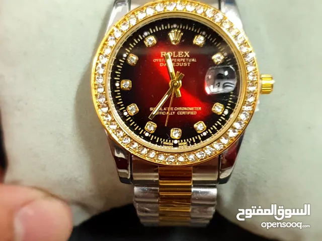ساعة رولكس كوبي بلون نادر أحمر خمري نسائية + كيس و علبة رولكس و قابل للتفاوض