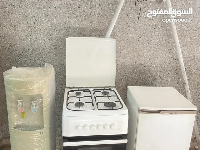 PACKAGE DEAL :GAS COOKER WATER DISPENSER .+ free microwave - عرض : فرن ، كولر ماي ،
