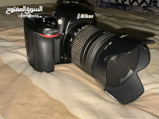 للبيع كاميرا احترافية Nikon مع عدسة Sigma مناسبة للتصوير الفوتوغرافي والفيديو بجودة عالية!
