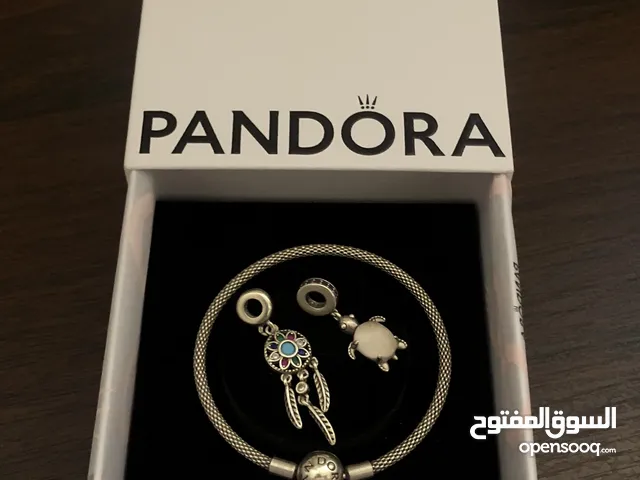 PANDORA bracelet, for sale, plus two charms as a gift. price for all 60 dinars